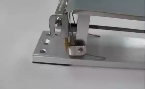 A left wedge roller is shown in this photograph, that is pushed by the screw.